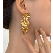 Load image into Gallery viewer, Long floral gold earrings
