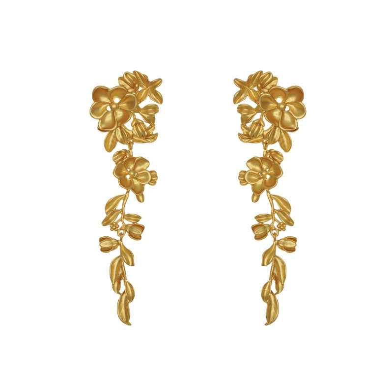 Long gold-tone floral earrings